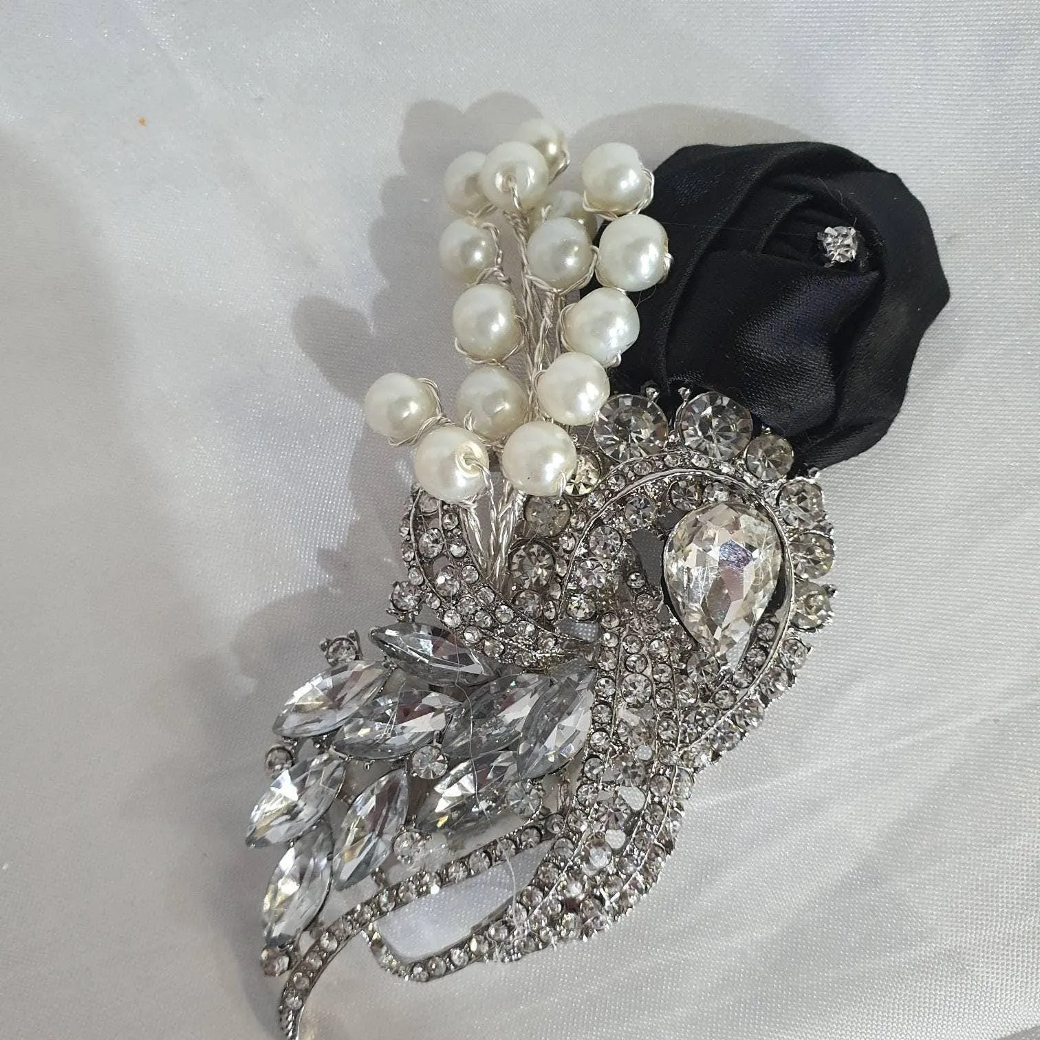 Crystal and pearl brooch bouquet with pearl & rhinestone drape by Crystal wedding uk