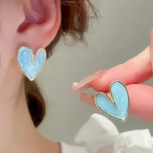 Gold-Framed Blue Heart Studs