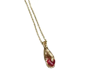 Hand with Ruby Pendant