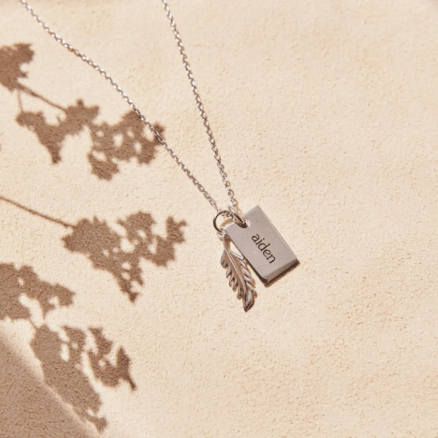 Vertical Flamingo Feather Charm by Lindsey Gurk