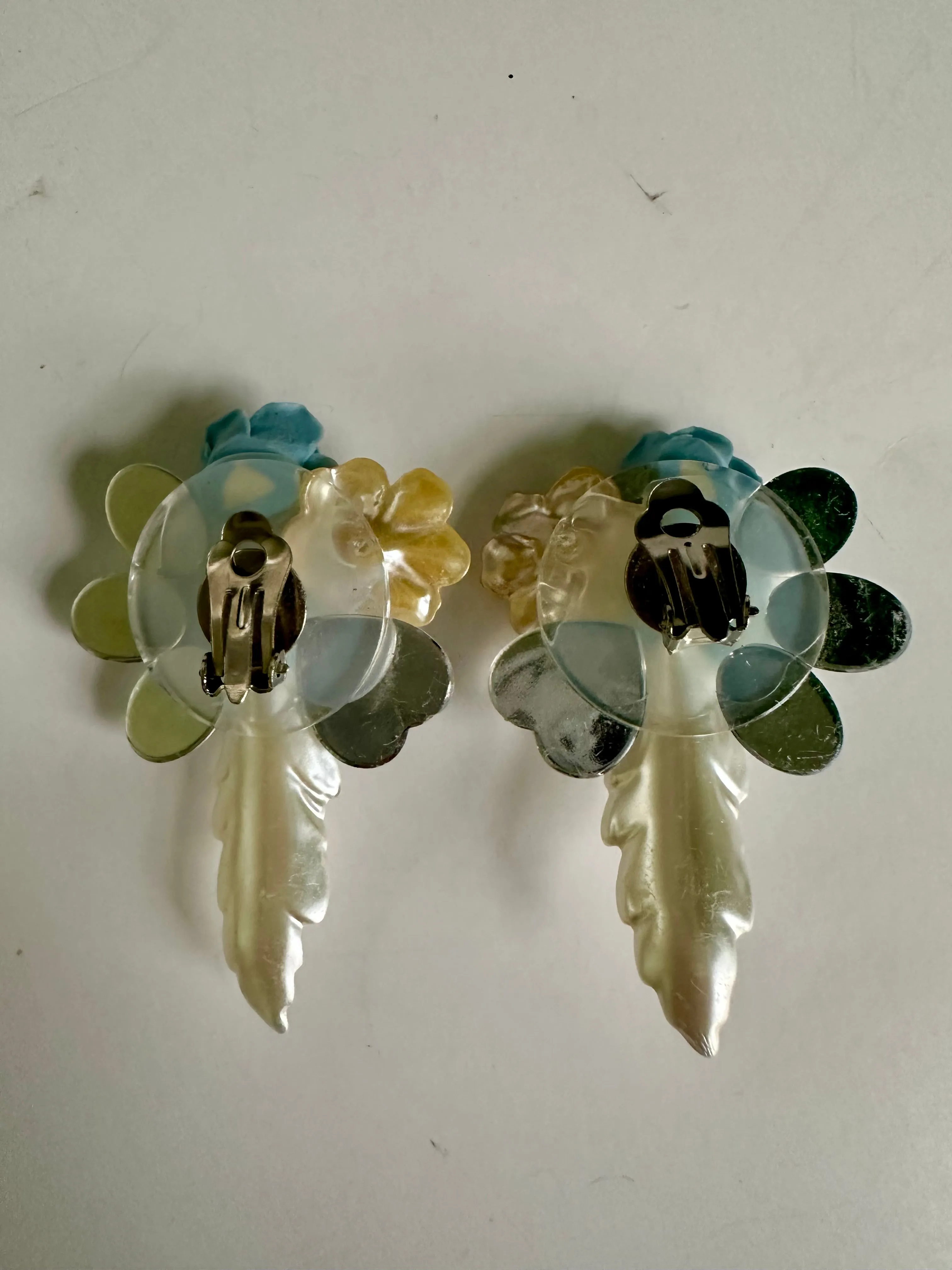 Vintage Blue Plastic Flower Clip On Earrings Crystal Textured Wings Leaves